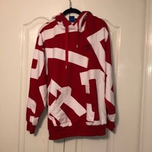 A red and white adidas hoodie